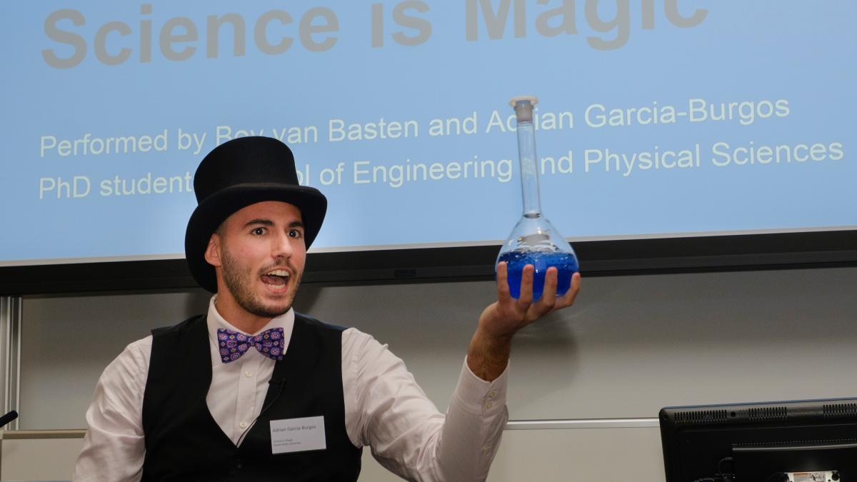 Magician using science props to perform magic 