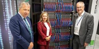 Prof. Sir Peter Mathieson, Principal of the University of Edinburgh, with Feryal Clark, Minister for AI and Digital Government, and Prof. Mark Parsons, Director of EPCC and Dean of Research Computing.