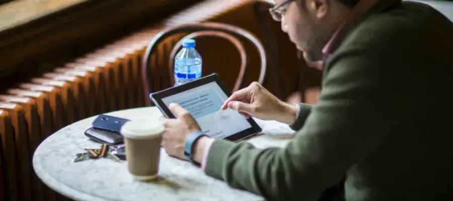man with ipad