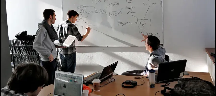 Informatics students in a hackathon