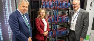 Prof. Sir Peter Mathieson, Principal of the University of Edinburgh, with Feryal Clark, Minister for AI and Digital Government, and Prof. Mark Parsons, Director of EPCC and Dean of Research Computing.