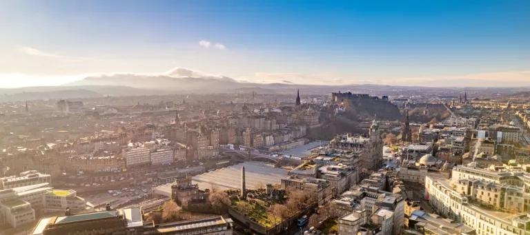 Aerial view of Edinburgh city centre with blue skies 