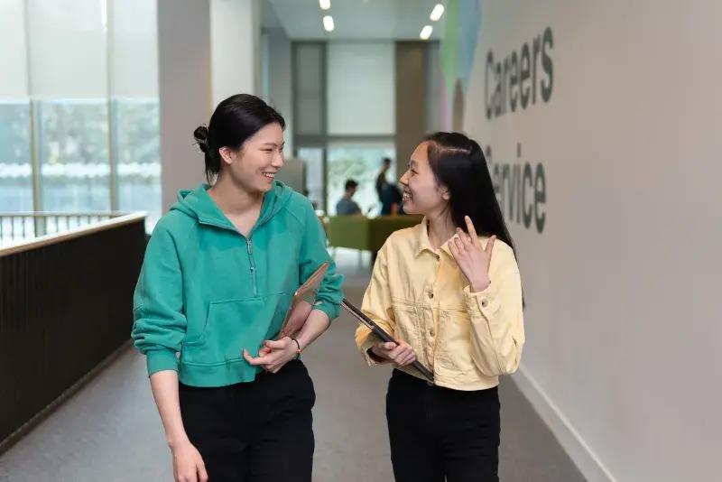 Students chatting outside the Careers Service in the Nucleus.